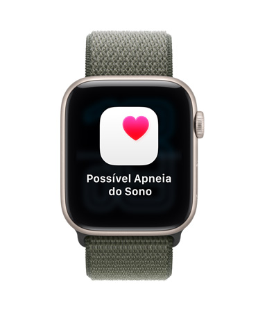 Apple Watch SE 3 com caixa estelar de alumínio, pulseira loop solo esportiva floresta e Digital Crown na lateral direita. A tela mostra uma notificação de possível apneia do sono, com um coração rosa dentro de um ícone branco