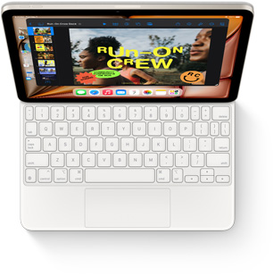Tampak dari atas iPad Air dengan Magic Keyboard berwarna putih.