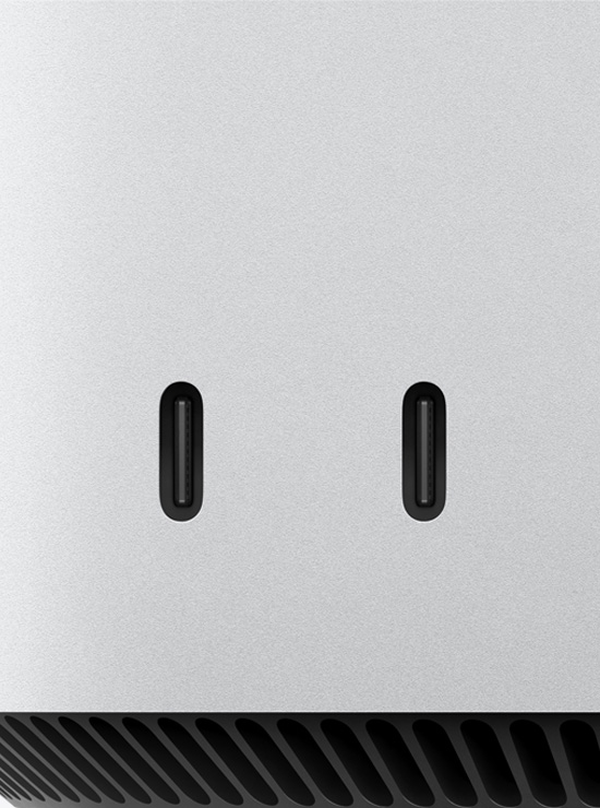 Mac mini esipaneeli kahe USB‑C liidese lähivaade.