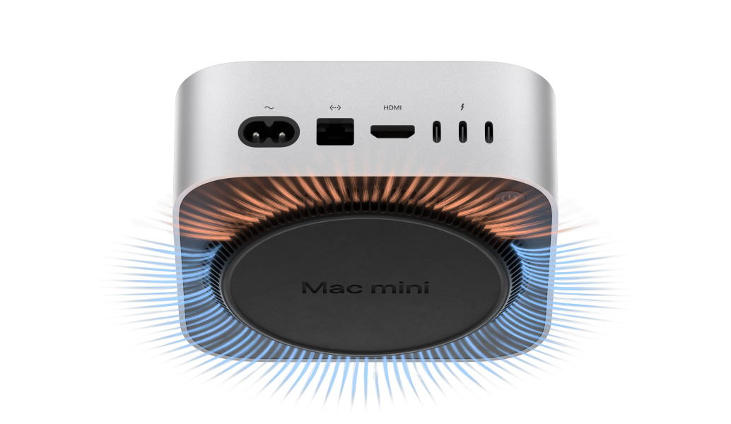 Vaade Mac mini tagumistele liidestele läbipaistvas illustratsioonis, mis näitab alumiiniumkorpuse all olevaid termilisi ja ventilatsioonisüsteeme.